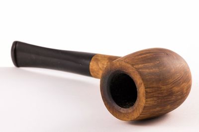 Close-up of machine part against white background