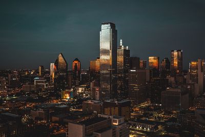 Illuminated cityscape at night