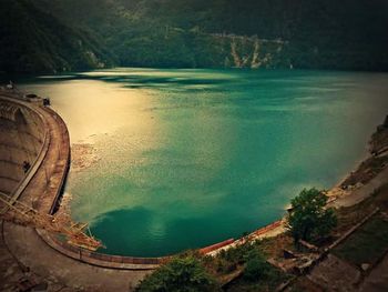 High angle view of trees by calm river