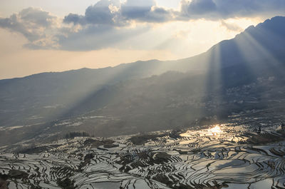 Scenic view of mountains against sky during winter