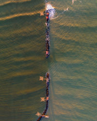 Aerial view of groyne in sea