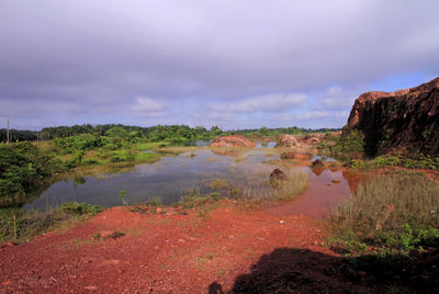 View of landscape against cloudy sky
