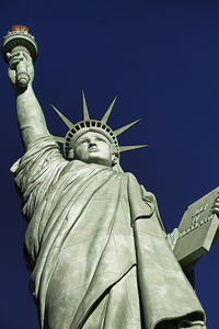 Low angle view of statue against the sky