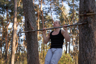 Man exercising at park