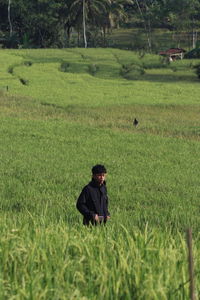 Man standing in field