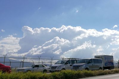 Cars against sky