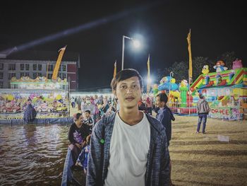 Group of people in traditional clothing at night