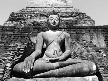 Low angle view of buddha statue