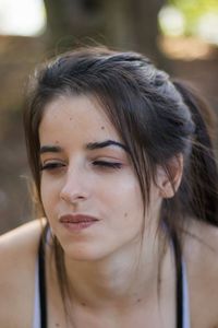 Close-up portrait of young woman