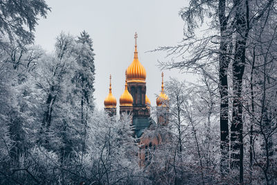 View of buildings against sky during winter