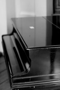 Close-up of piano on table at home