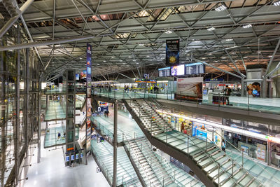 High angle view of people on illuminated ceiling