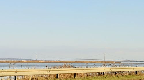 Suspension bridge against clear sky