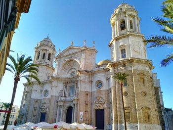 Low angle view of church against blue sky