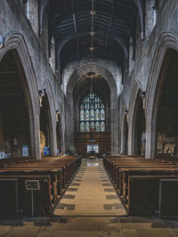 View of empty benches in building