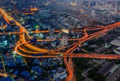 High angle view of light trails on road at night