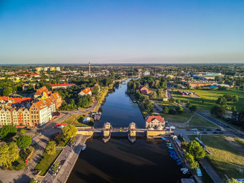 High angle view of buildings against clear sky