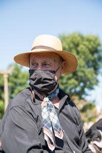 Argentinian senior man with face mask