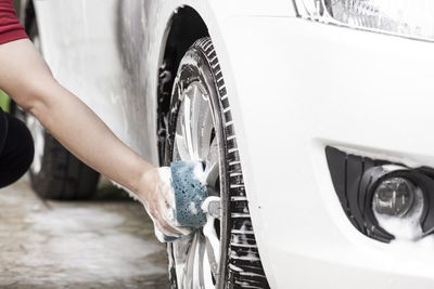 Close-up of hand holding car