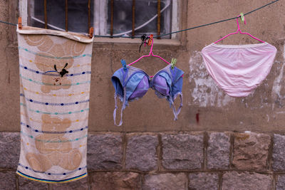 Close-up of clothes drying on clothesline