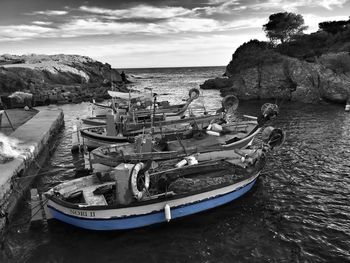 Boats moored in sea