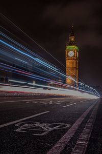 High angle view of light trails on road at night