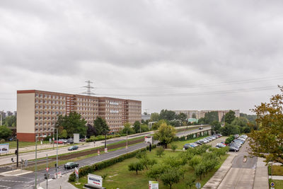 High angle view of street in city against sky