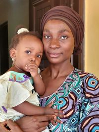 Portrait of mother and girl