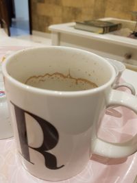 High angle view of coffee cup on table