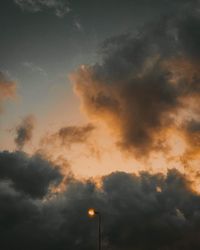 Low angle view of dramatic sky during sunset