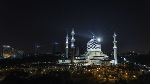 Illuminated city at night