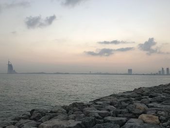 Scenic view of sea against sky during sunset