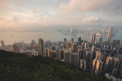 High angle view of buildings in city against sky