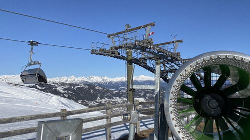 Ferris wheel against sky during winter