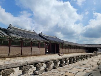 Low angle view of built structures against sky