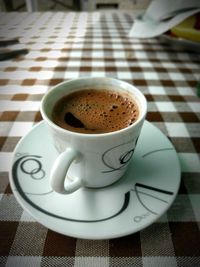 High angle view of coffee on table