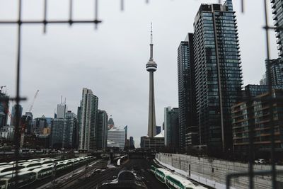 Modern buildings in city against sky