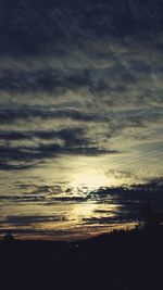 Scenic view of cloudy sky at sunset