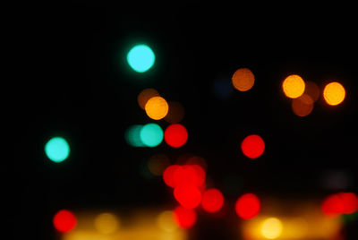 Defocused image of illuminated lights at night