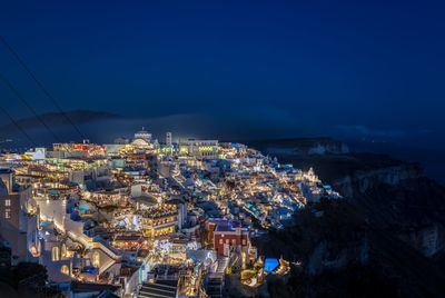 High angle view of illuminated city at night