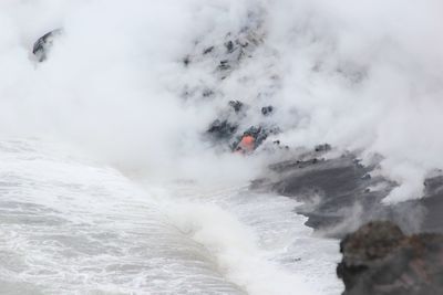 View of sea by lava