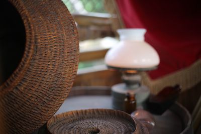 Close-up of wicker basket on table at home