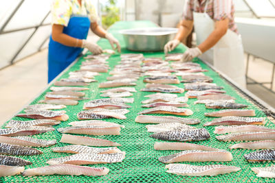 Food preservation by fish drying. dried tilapia. food processing of fishermen in thailand