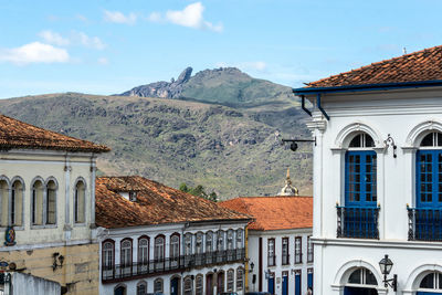 Buildings against sky