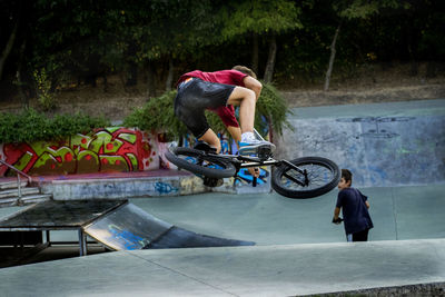 Man playing with skateboard