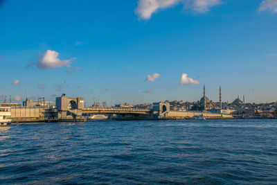 Scenic galata bridge view of sea against blue sky