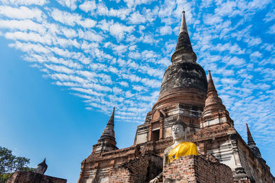 Low angle view of temple building against sky