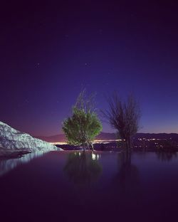 Scenic view of calm sea at night