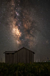 Low angle view of building against sky at night