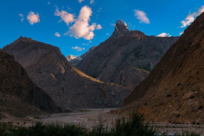 Panoramic view of rocky mountains against sky